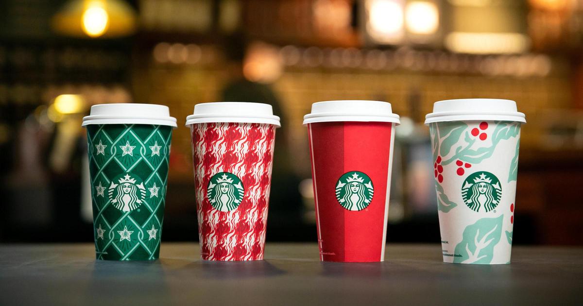 Starbucks представил рождественский дизайн чашек.